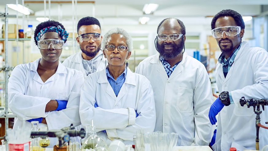 A group of Black microbiologists in the lab.