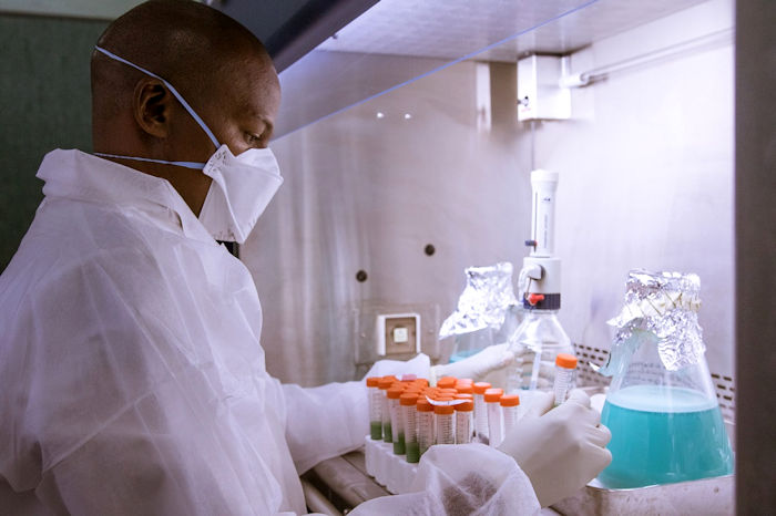 A laboratory technician at Mozambique's INS National TB Reference Lab prepares a sample. 