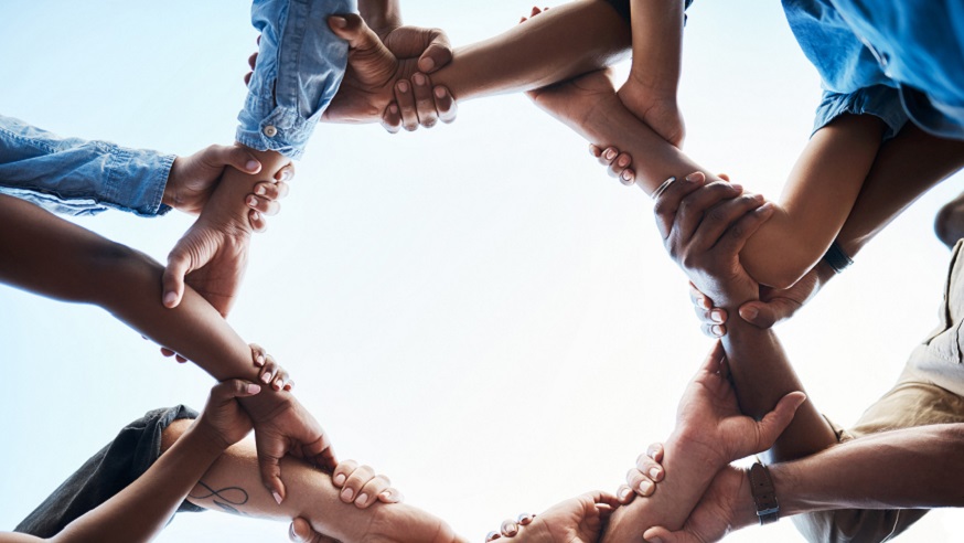 Hands and arms joined in a circle.